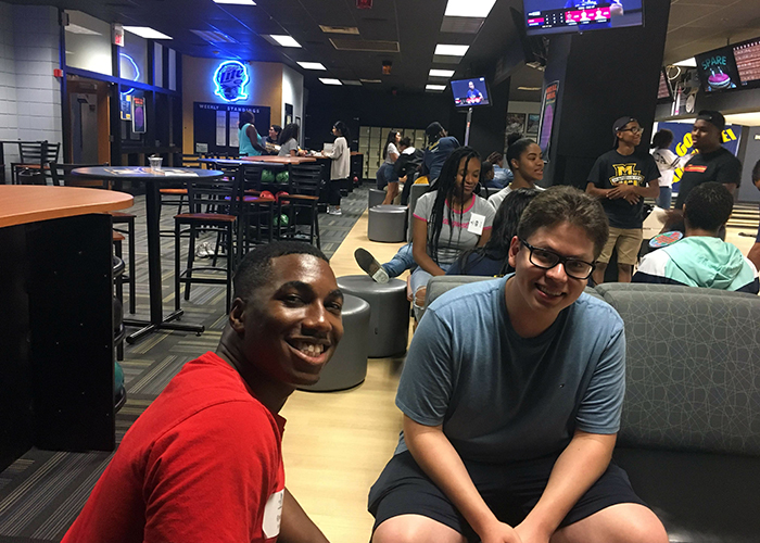 Student bowling at the Annex