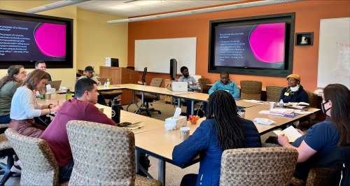Image of graduate students in classroom for productive teaching retreat 2023