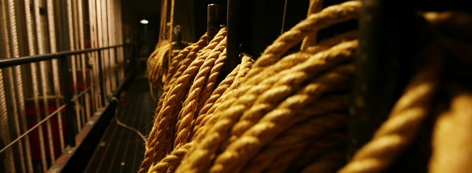 backstage image of ropes used to handle scenery