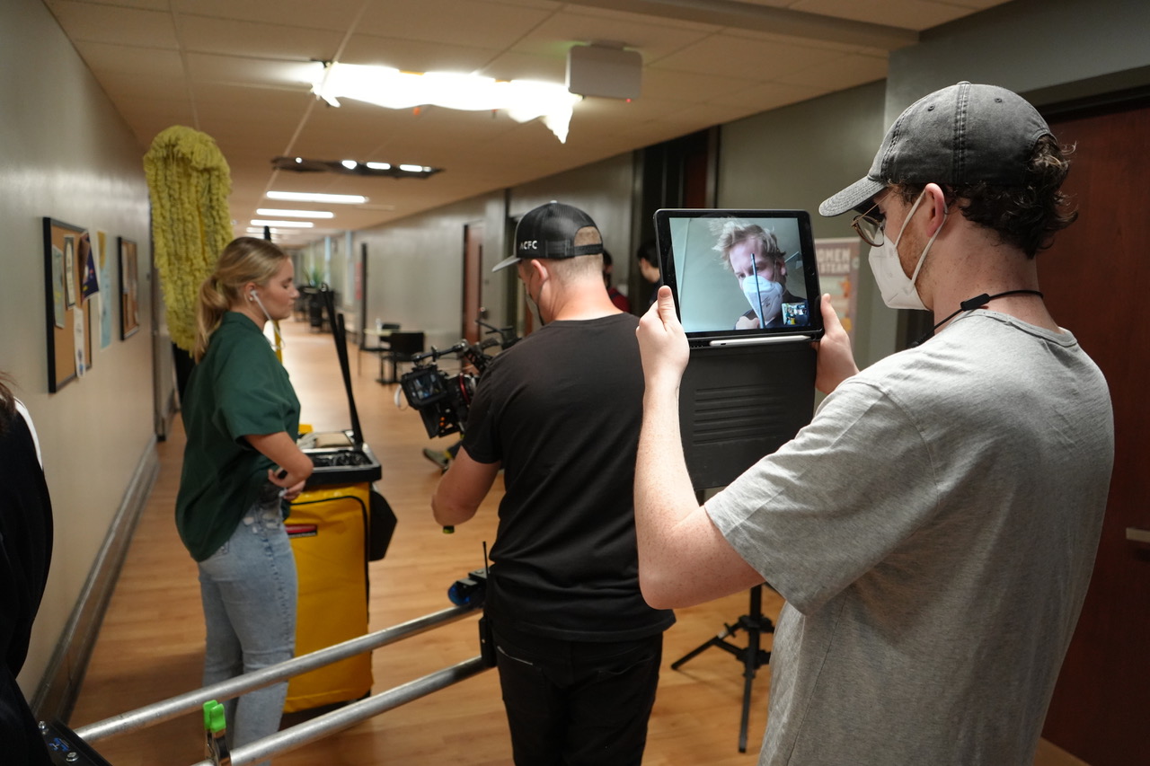 Students and faculty at work on the Diffraction film set.