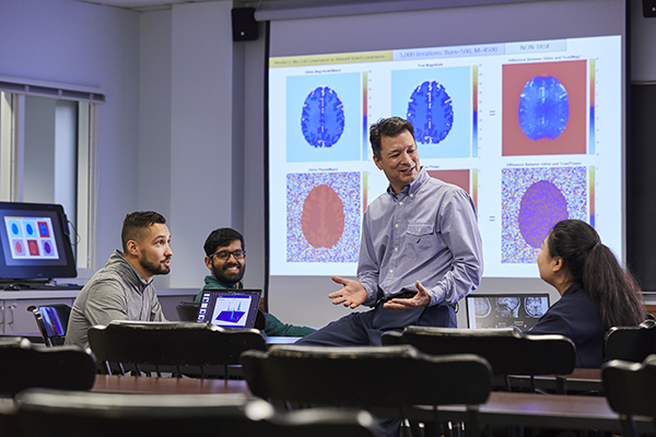 Nursing professor working with grad student