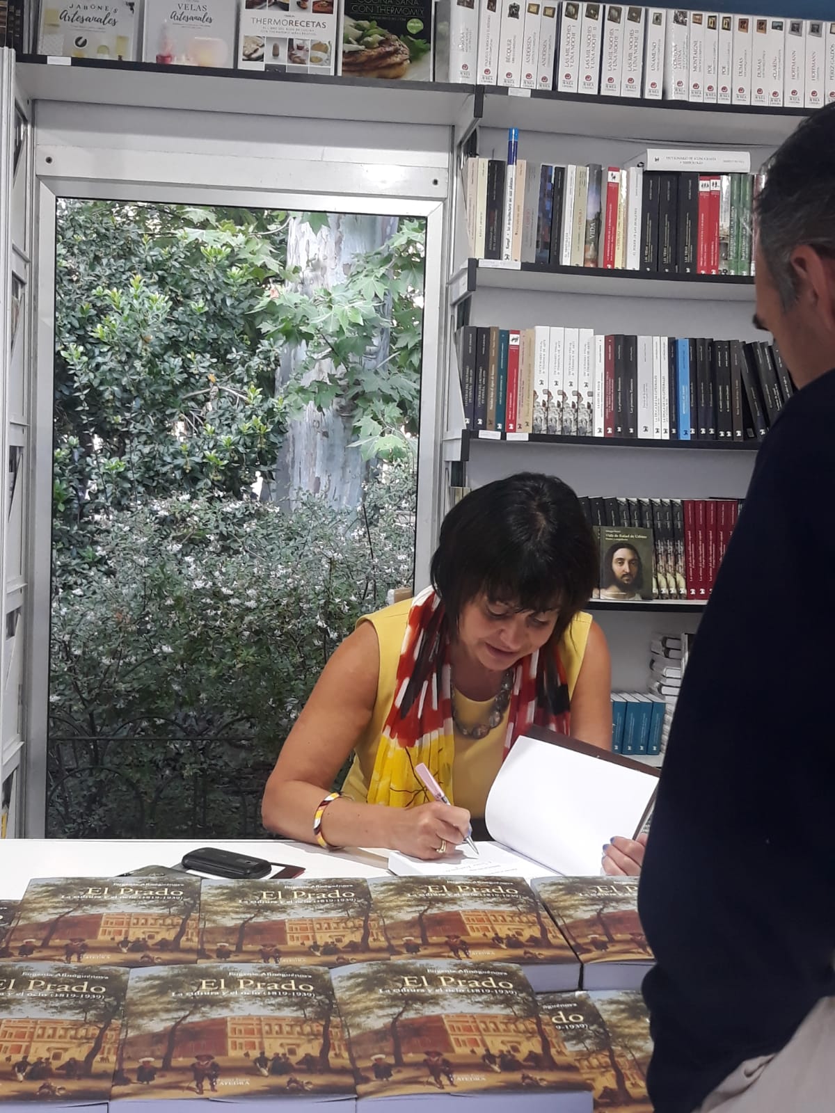Dr. Afinoguenova signing books