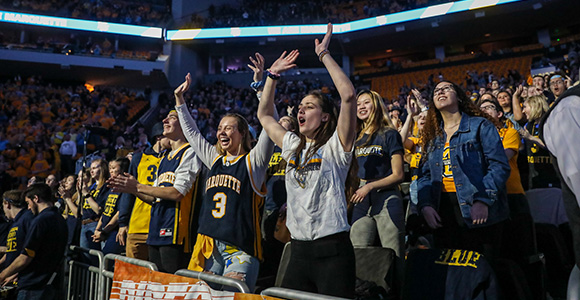 Students at Marquette basketball game