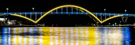 ambassador blog - Milwaukee Hoan bridge lit up with blue and gold colors