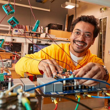 power electronics grad student working on electronics