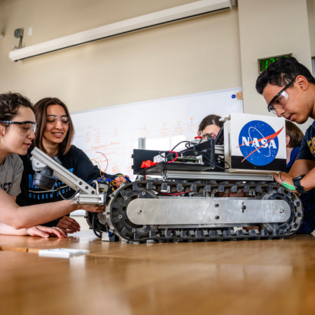 students working on a robot