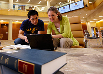 Students in the Marquette Law School building