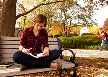 Student studying on the Marquette campus