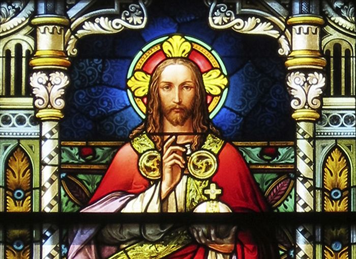 Stained glass window at Gesu Church depicting Jesus