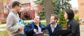 Education Graduate students talking on Marquette University campus