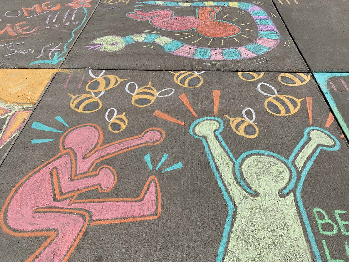 Sidewalk chalk art inspired by Keith Haring