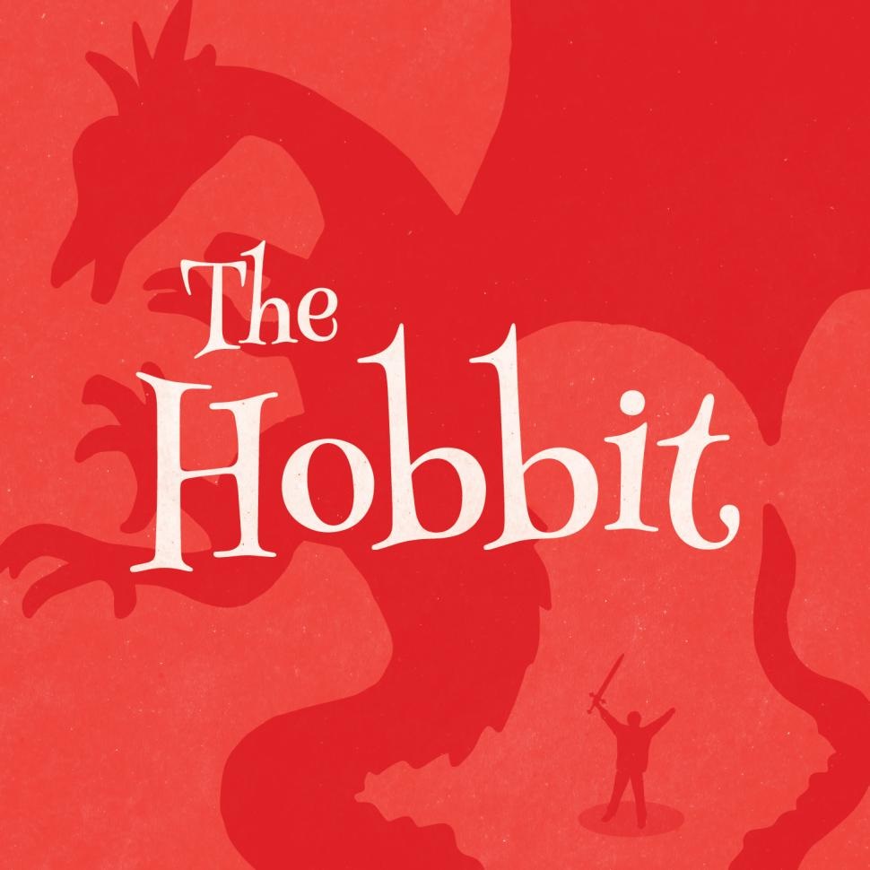 A theatre production of the Hobbit design with a red background and dragon