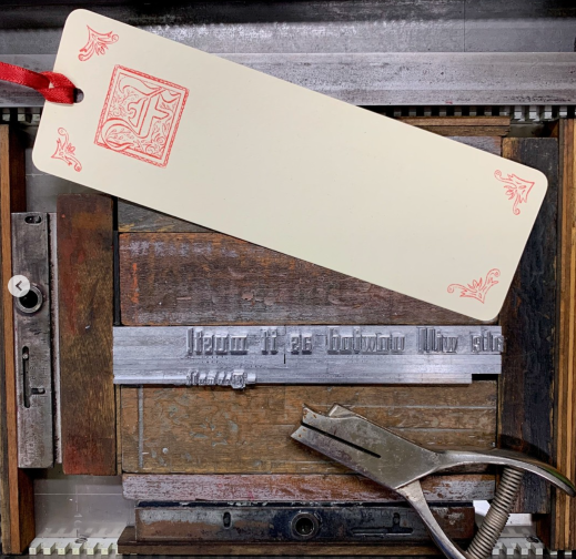 A bookmark sitting on a letterpress