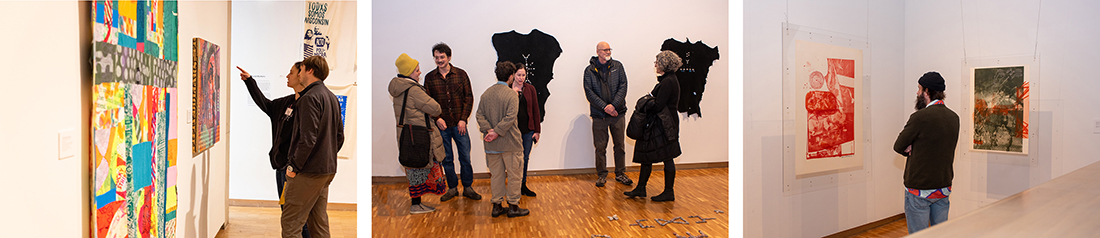 images of people looking at art
