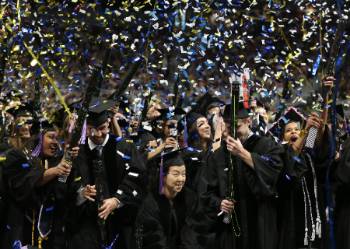 Marquette students celebrating commencement.
