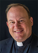 Rev. John Thiede, S.J.