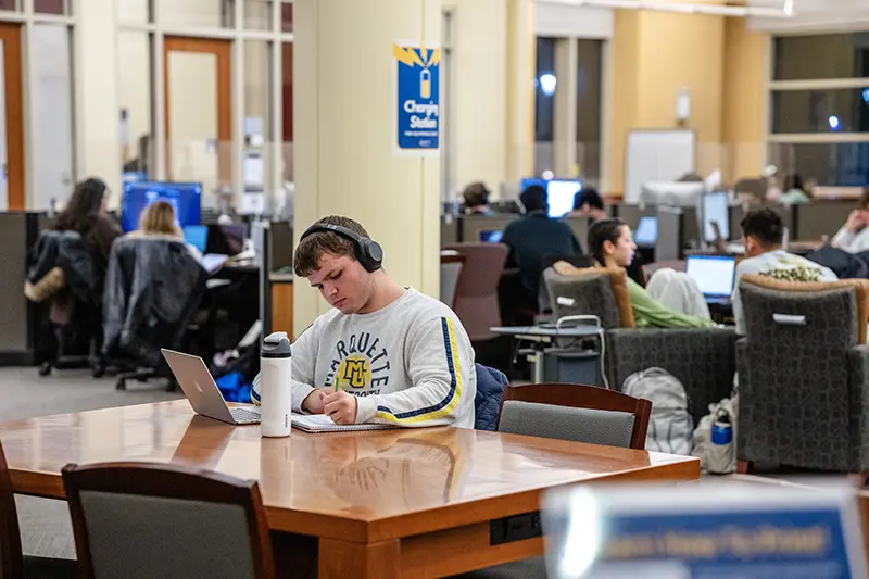 Student studying in library