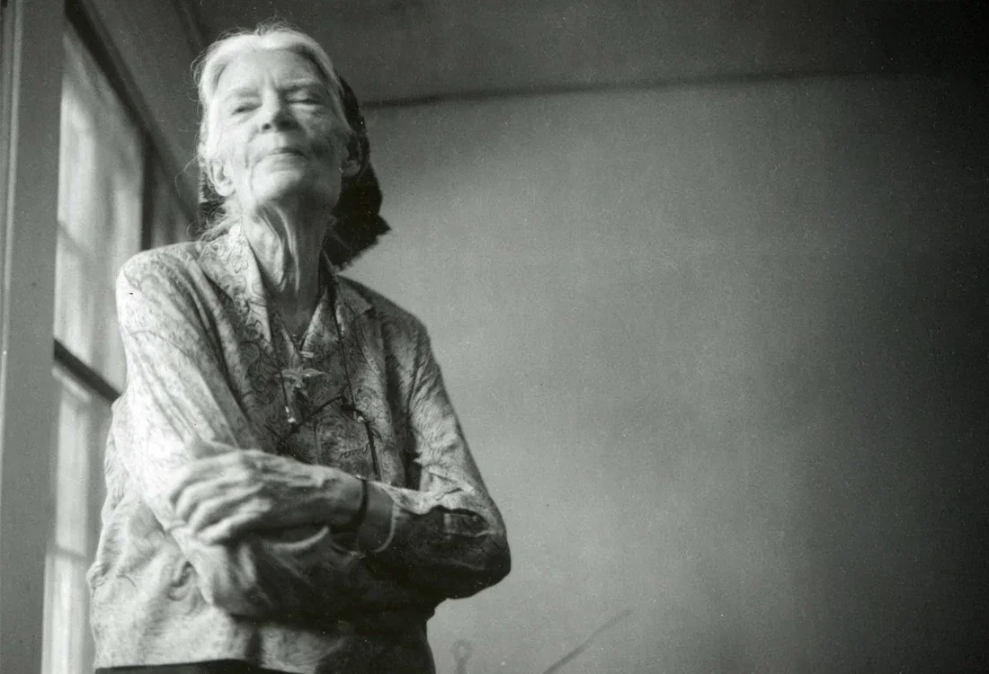 Dorothy Day standing
