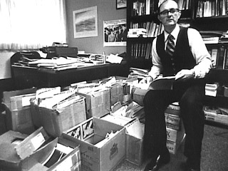 History faculty member in his office