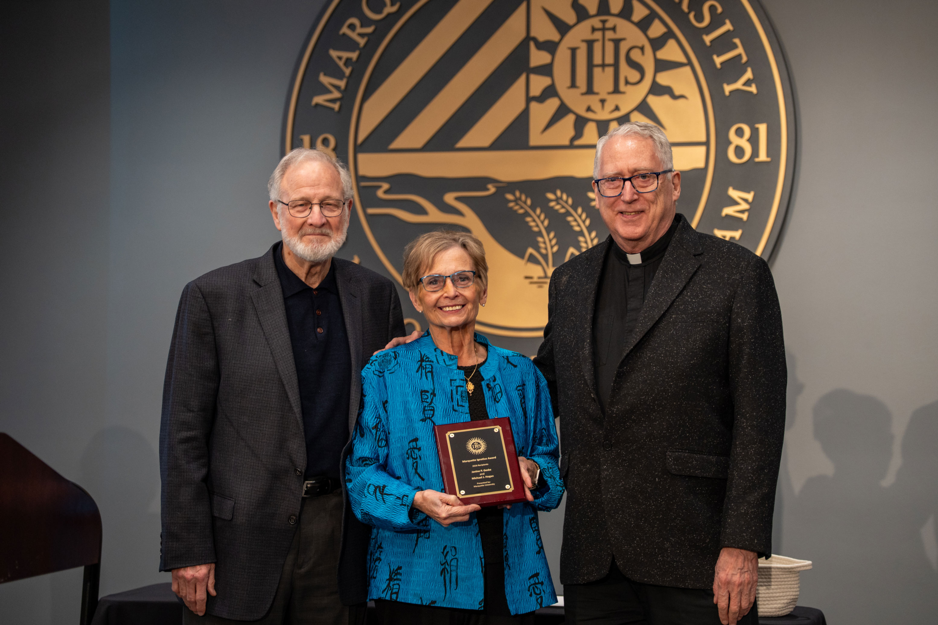Janine and Michael receiving award