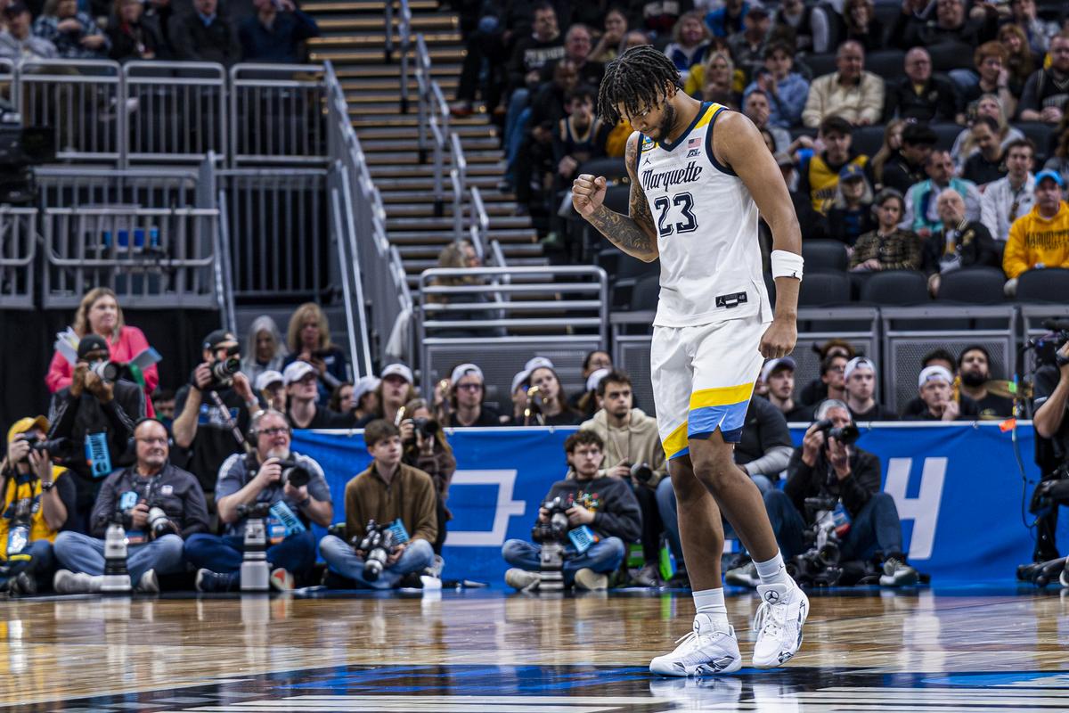 David Joplin celebrates on the court