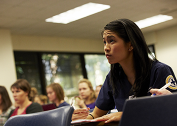 A Marquette Nursing student in a class