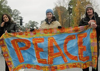 Students holding peace banner