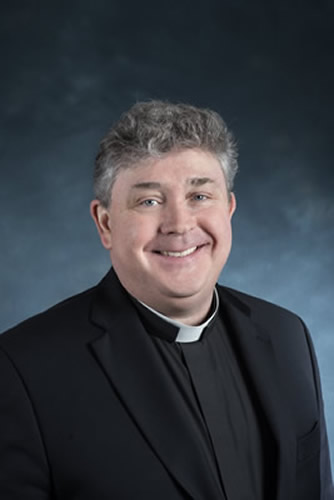 Rev. Charles R. Gallagher, S.J.