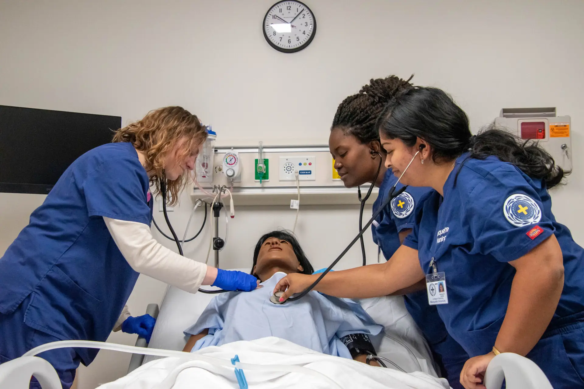 Nursing students working together