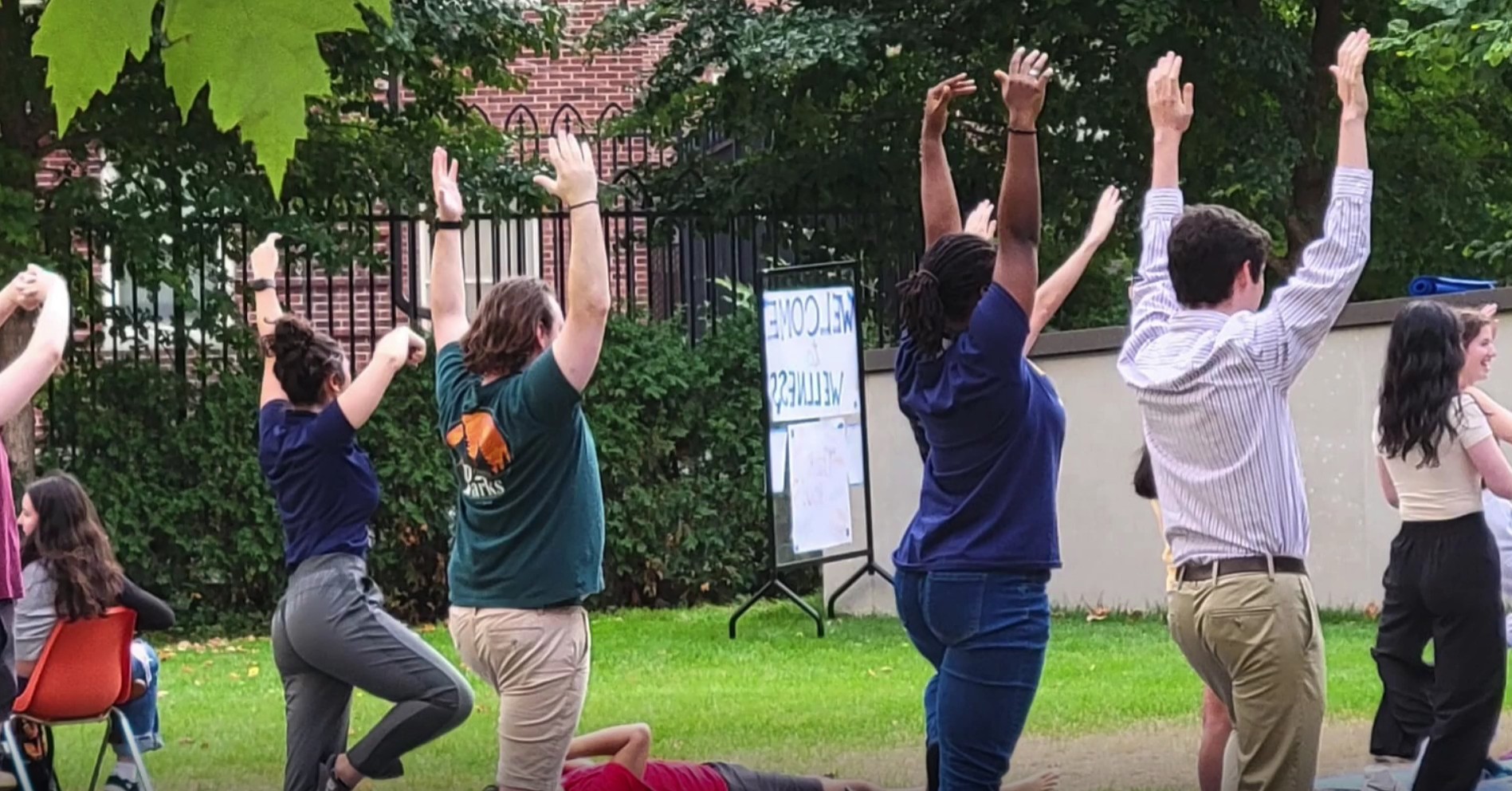 young adults doing yoga
