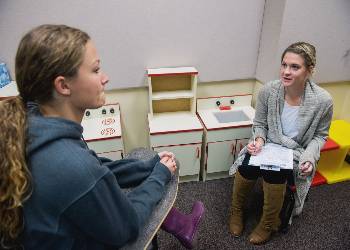 A patient with a therapist during a therapy session