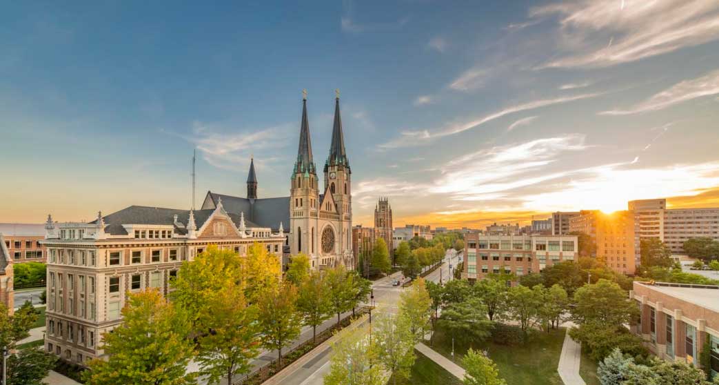 Aerial view of Wisconsin Avenue, Marquette campus buildings and Church of the Gesu