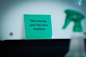 photo of a sign indicating space has been sanitized